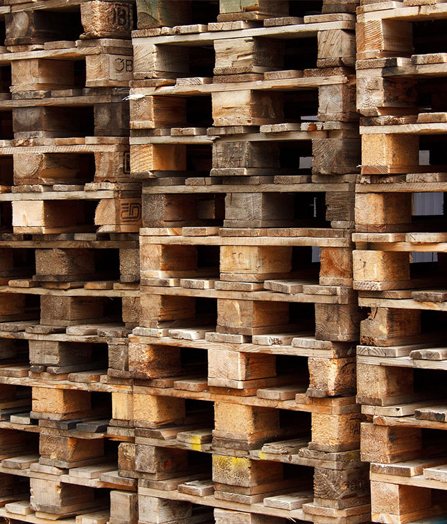 Used wooden pallets prepared for industrial recycling